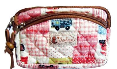 批发韩国小熊拉链手拎布艺化妆包 广州小商品代发全解析